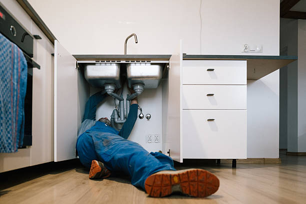 Professional Emergency Plumber technician working in Rockville, CT